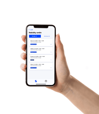 An employee holding a phone with shift offers in the Dayswaps app